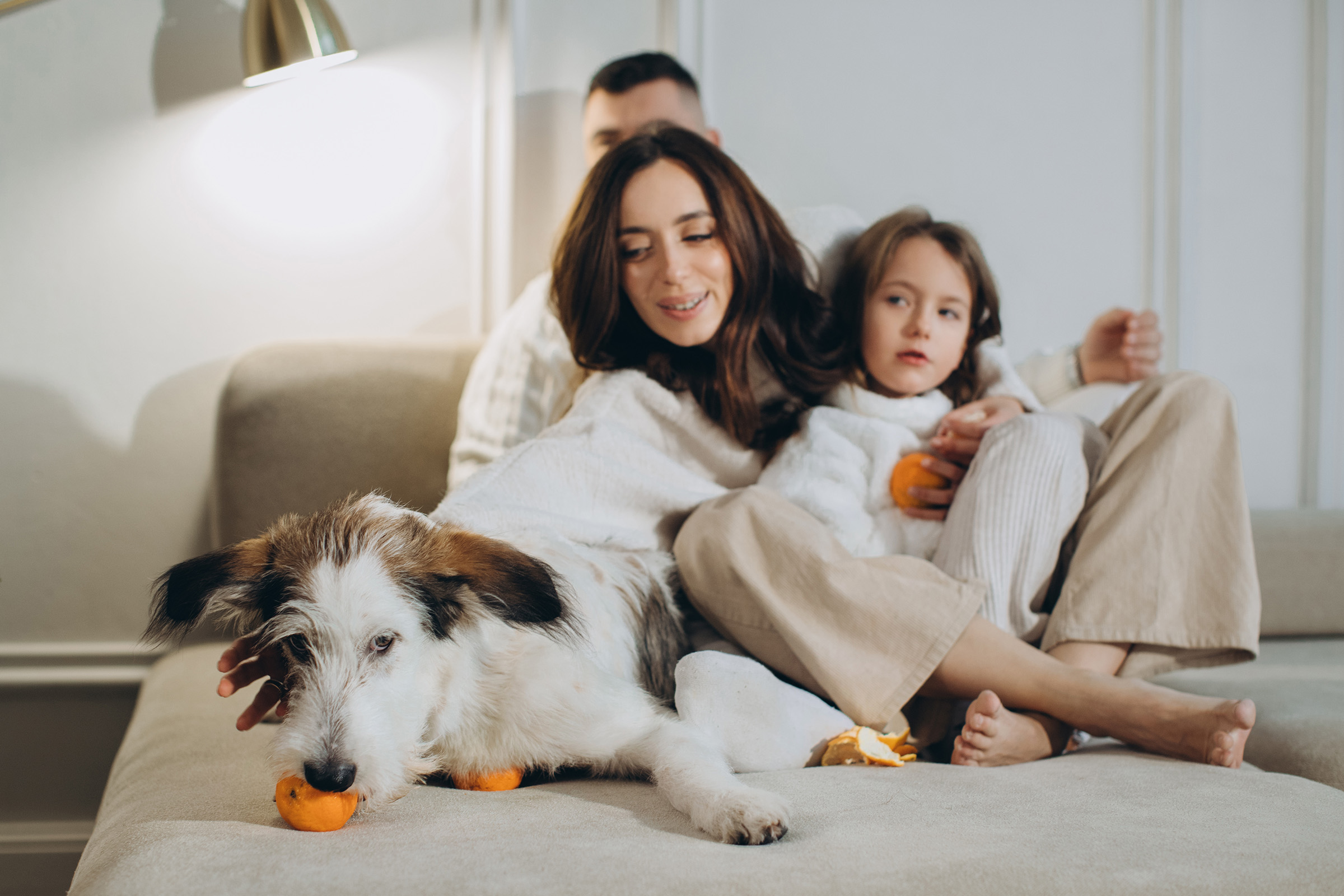 Family and Dog on Couch